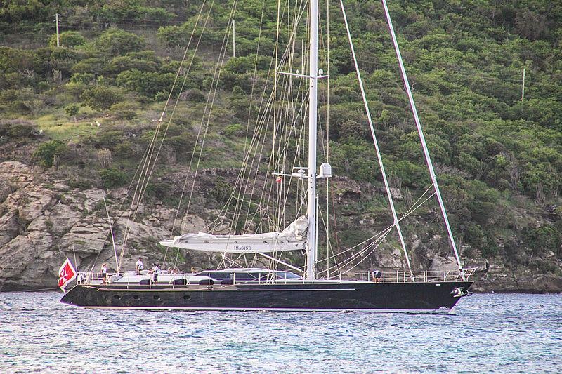 a boat sailing on the water aboard IMAGINE Yacht for Charter