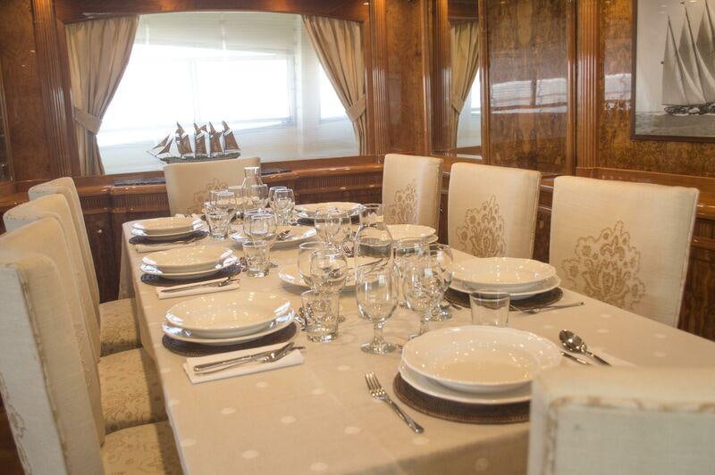 a table set for a dinner aboard KIRIOS Yacht for Charter