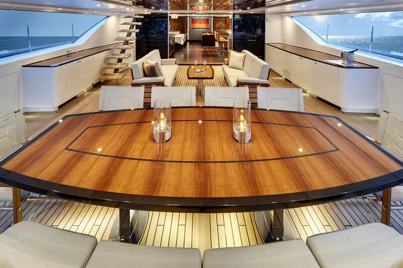 a room with a table and chairs aboard KOKOMO Yacht for Charter