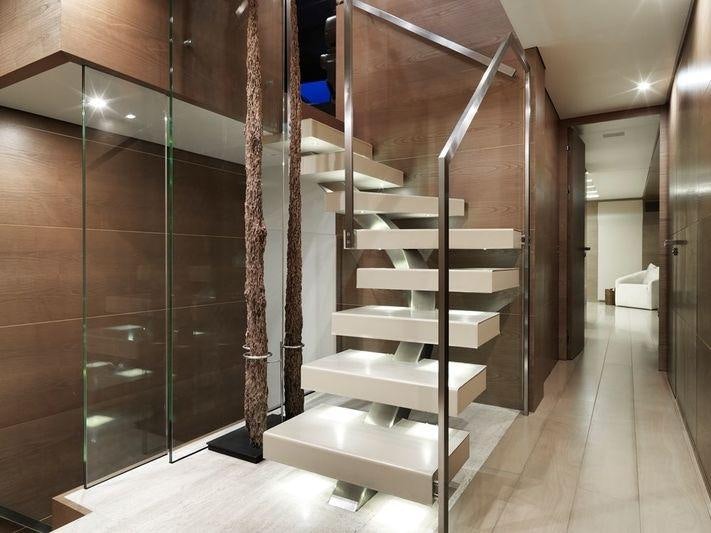 a staircase in a building aboard NAIA Yacht for Charter