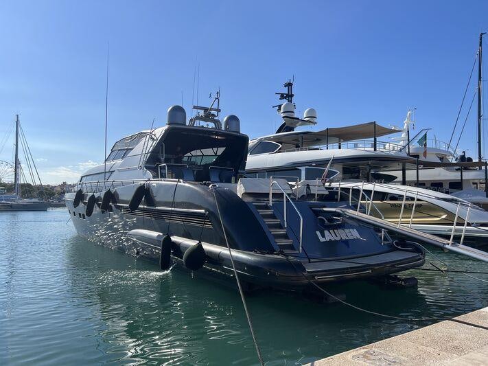 a boat docked at a pier aboard LAUREN V Yacht for Charter