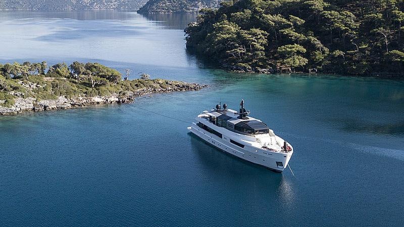 a boat sailing on the water aboard SUN Yacht for Charter