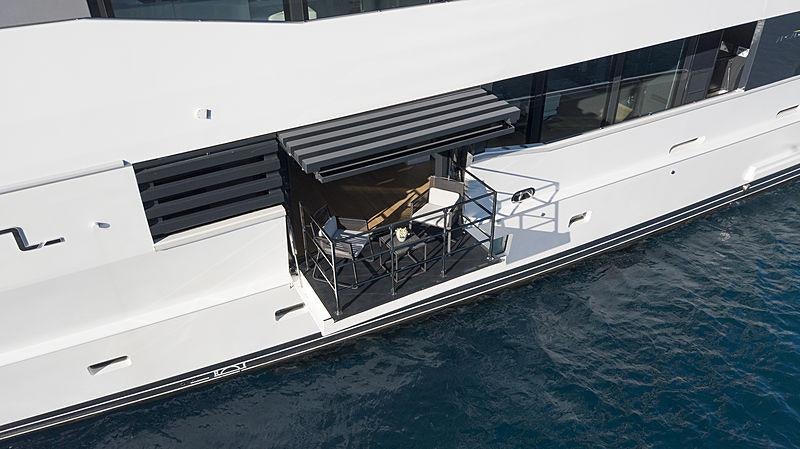 a white boat with a deck aboard SUN Yacht for Charter