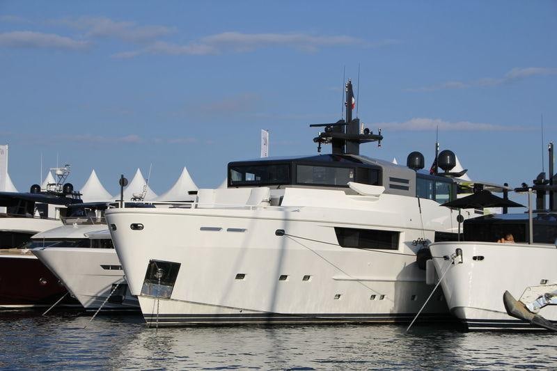 a couple of boats sit in the water aboard SUN Yacht for Charter