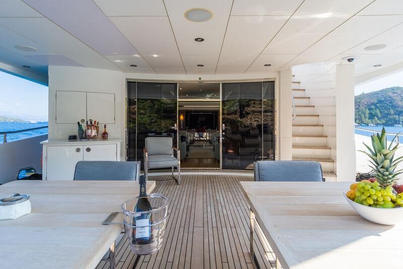 a modern looking kitchen with a large open window aboard FREEDOM Yacht for Charter