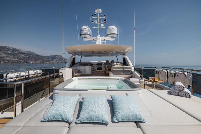 a large ship in the water aboard RIVIERA LIVING Yacht for Charter