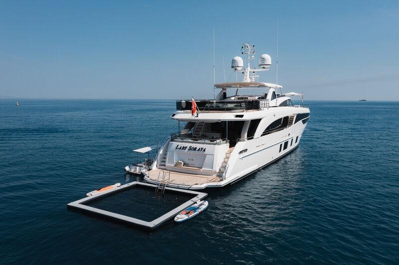 a boat in the water aboard RIVIERA LIVING Yacht for Charter