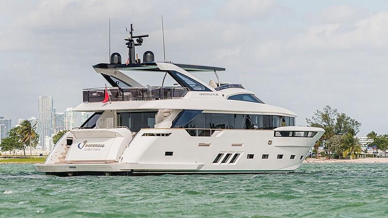 a white boat in the water aboard THE PEDDLER Yacht for Sale