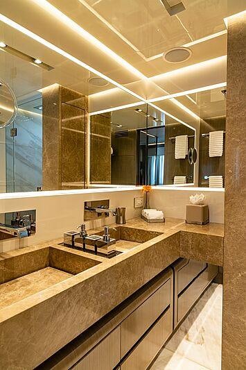 a bathroom with a large mirror aboard THE PEDDLER Yacht for Sale