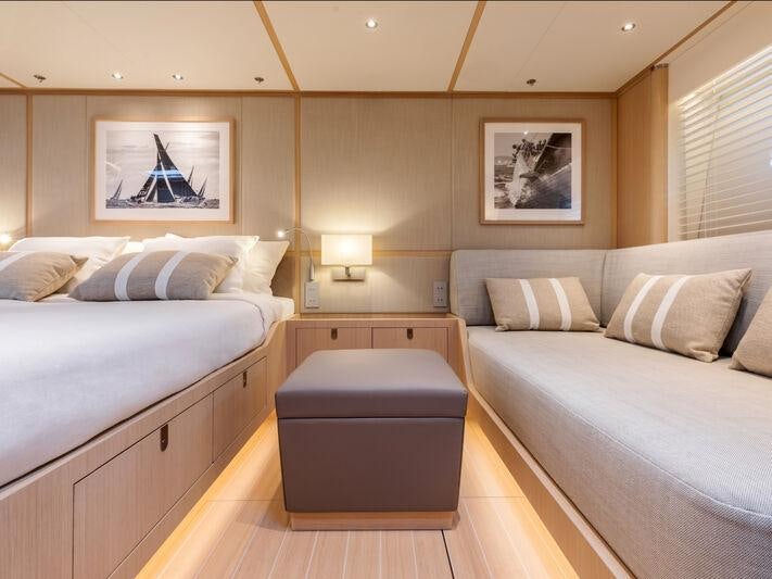 a room with two beds aboard ALIX Yacht for Sale