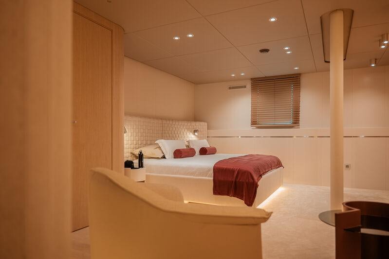 a room with two beds aboard REPOSADO Yacht for Charter