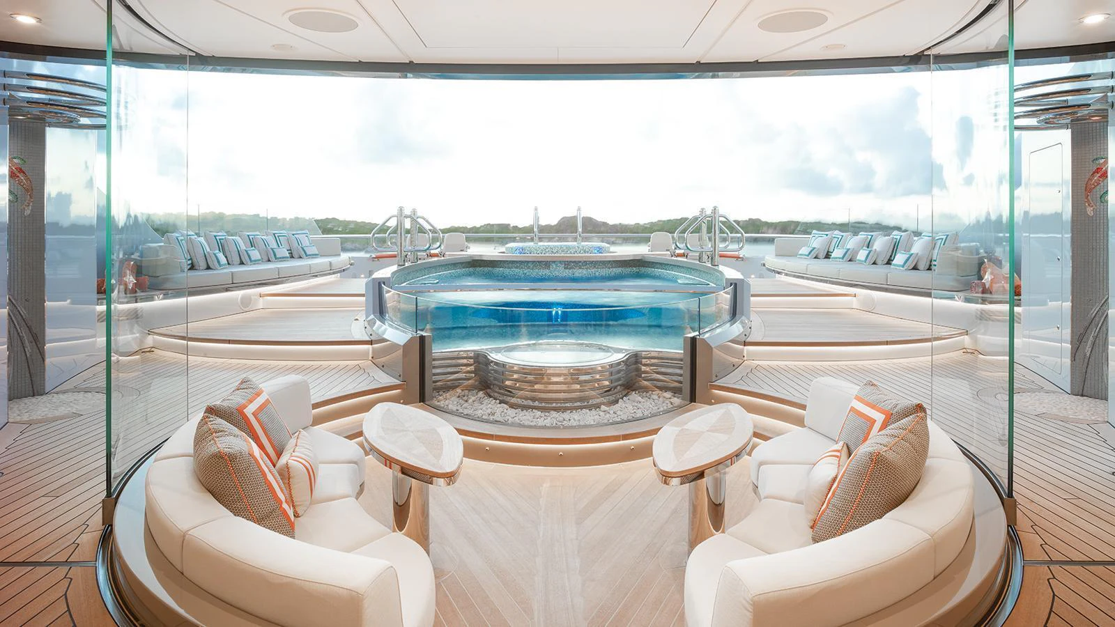 a room with a view of the water and the pool aboard WHISPER Yacht for Charter