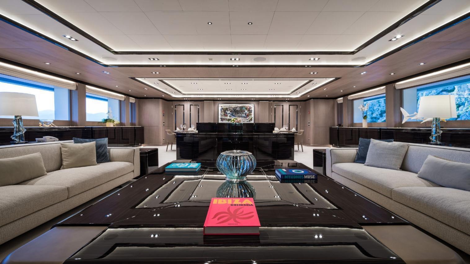 a living room with a piano aboard O'PTASIA Yacht for Charter