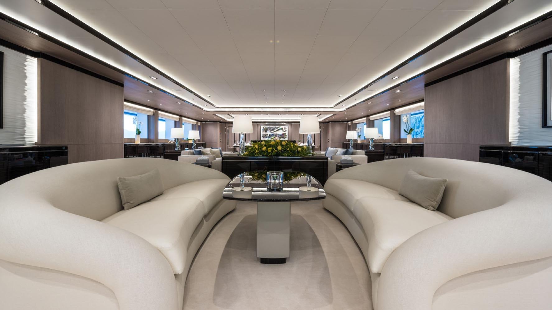 a living room with a couch and a coffee table aboard O'PTASIA Yacht for Charter