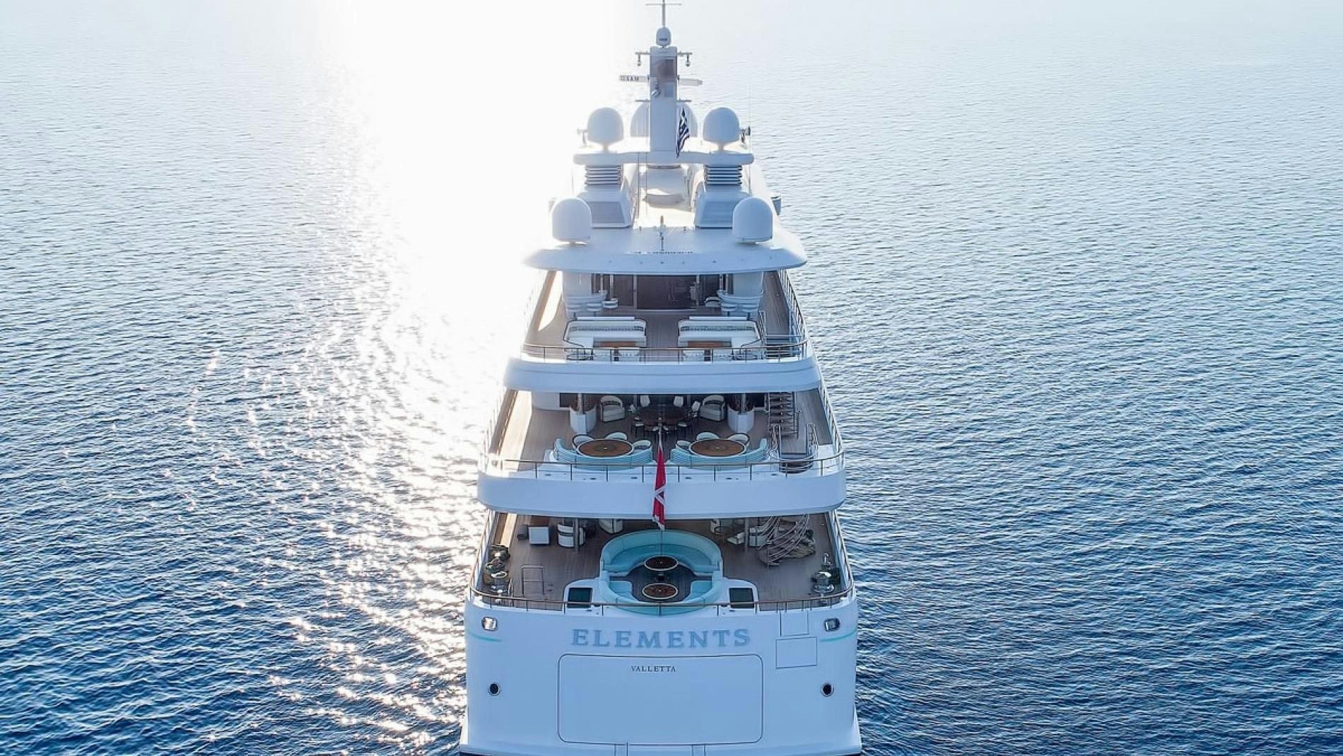 a large ship in the water aboard ELEMENTS Yacht for Charter