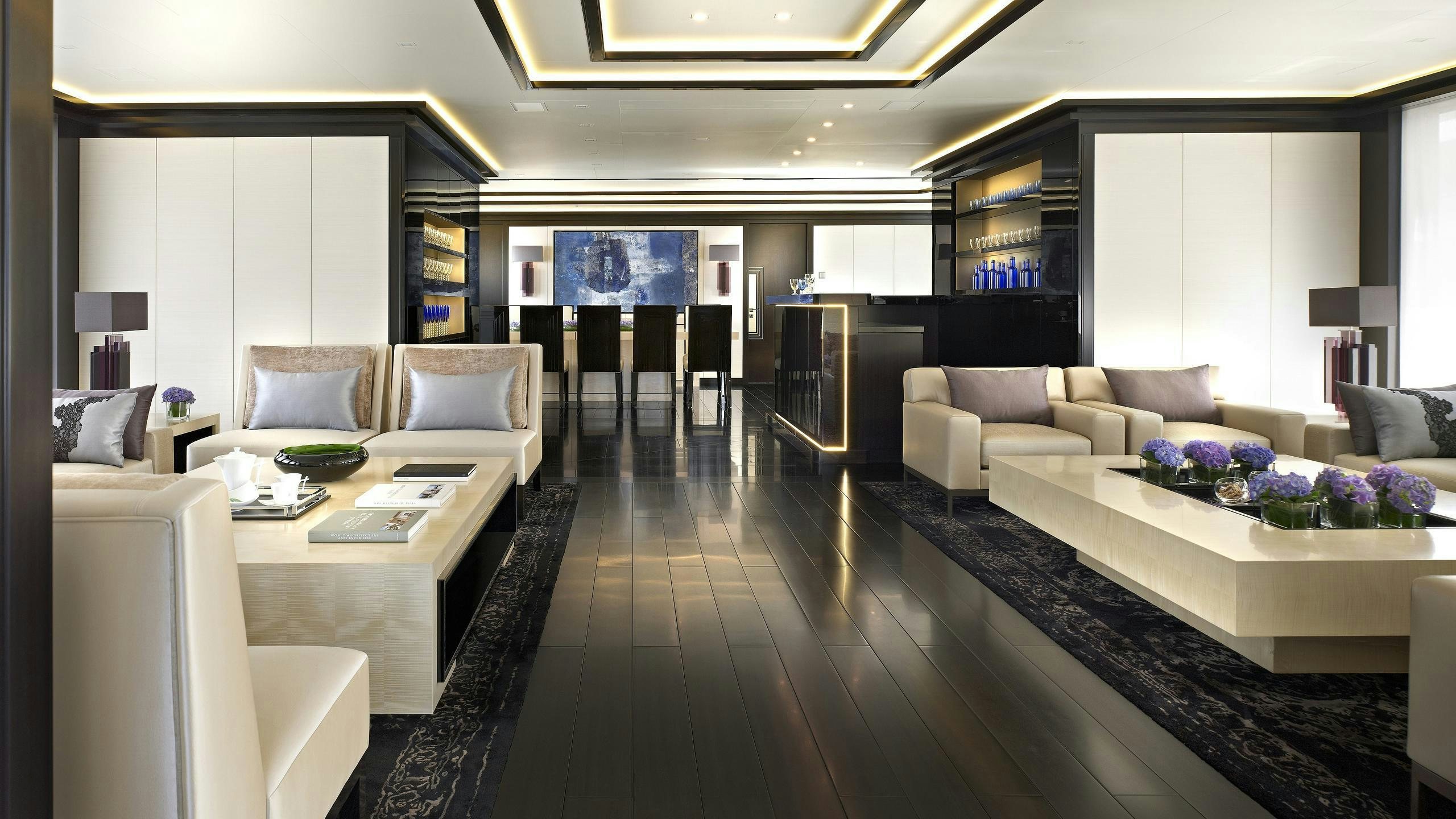 a living room with a wood floor aboard LADY VERA Yacht for Charter