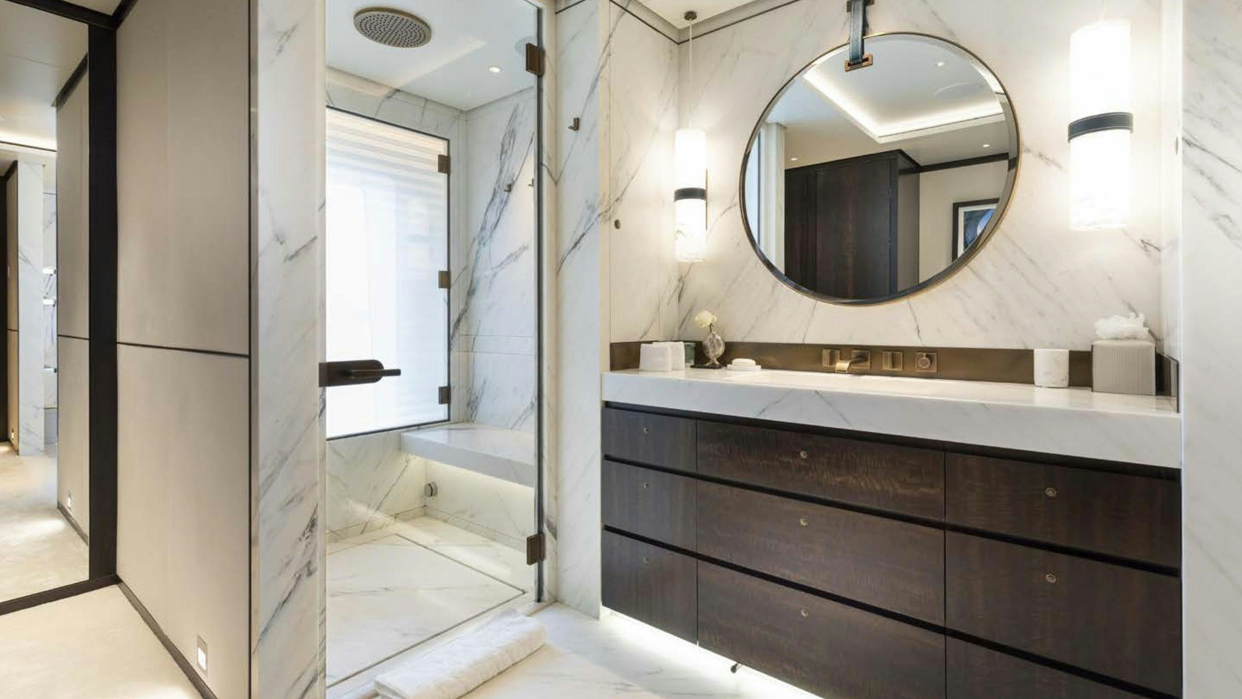 a bathroom with a large mirror aboard LUNASEA Yacht for Charter