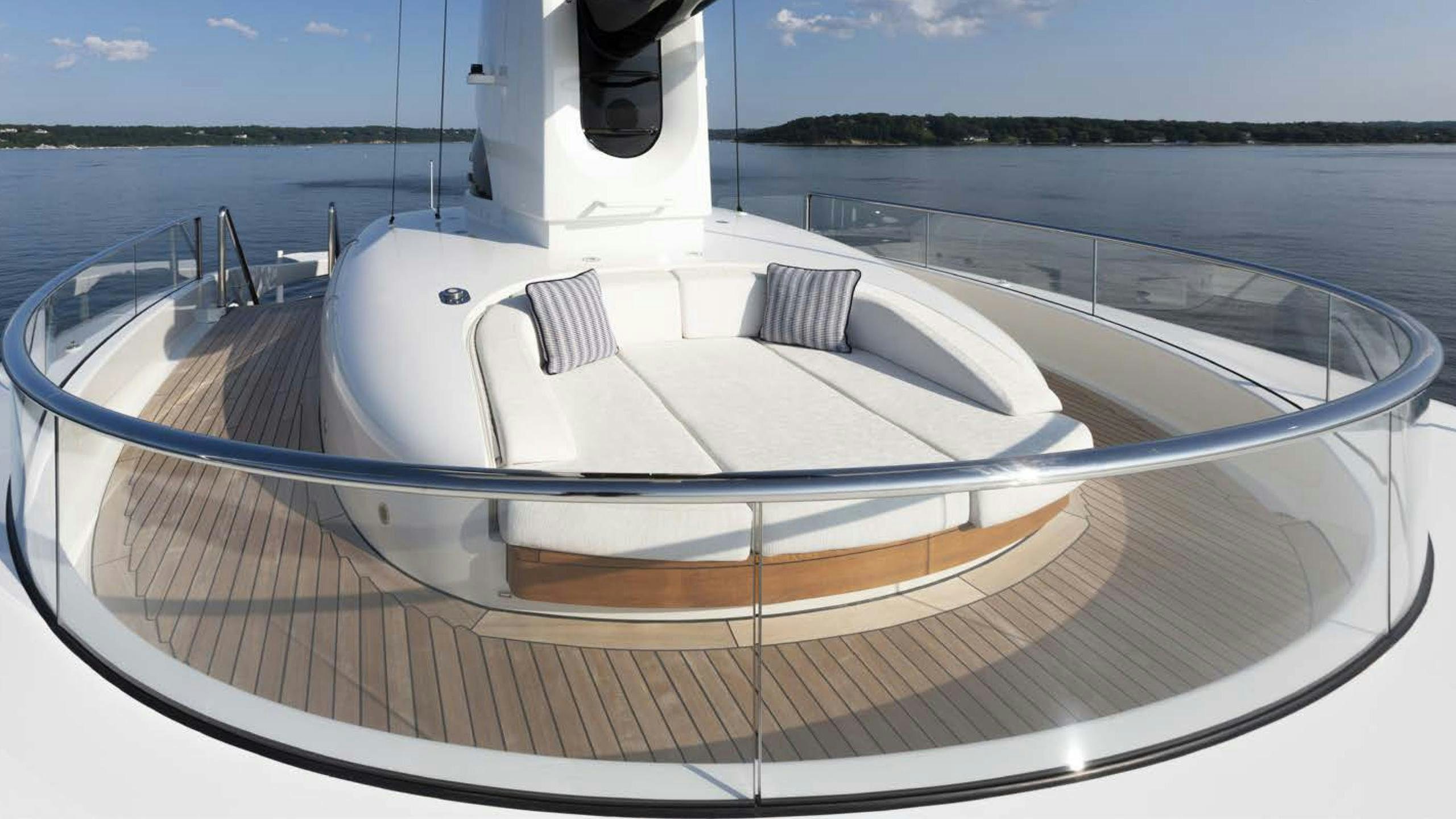 a white boat on a body of water aboard LUNASEA Yacht for Charter