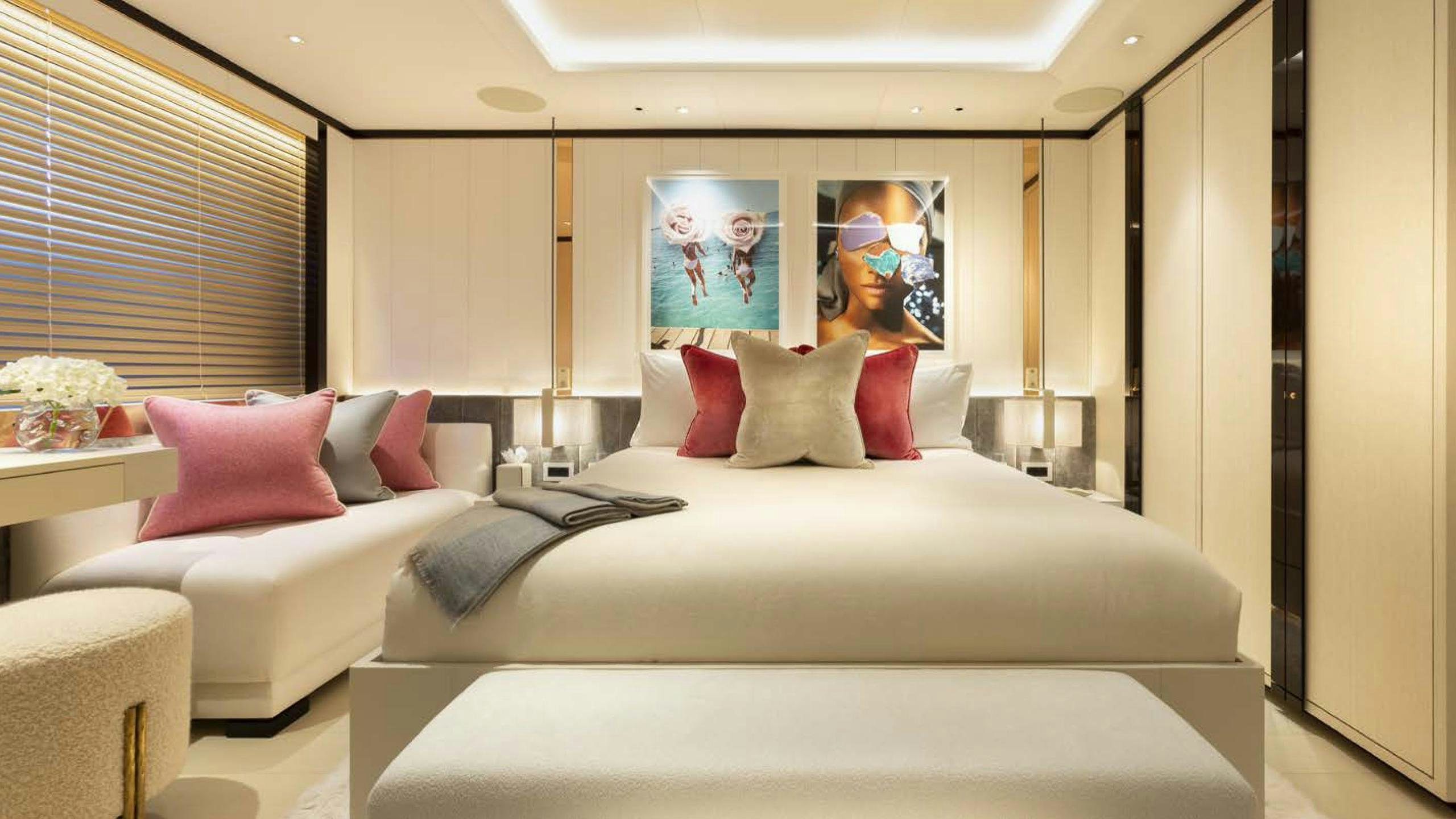 a large bed in a room aboard LUNASEA Yacht for Charter