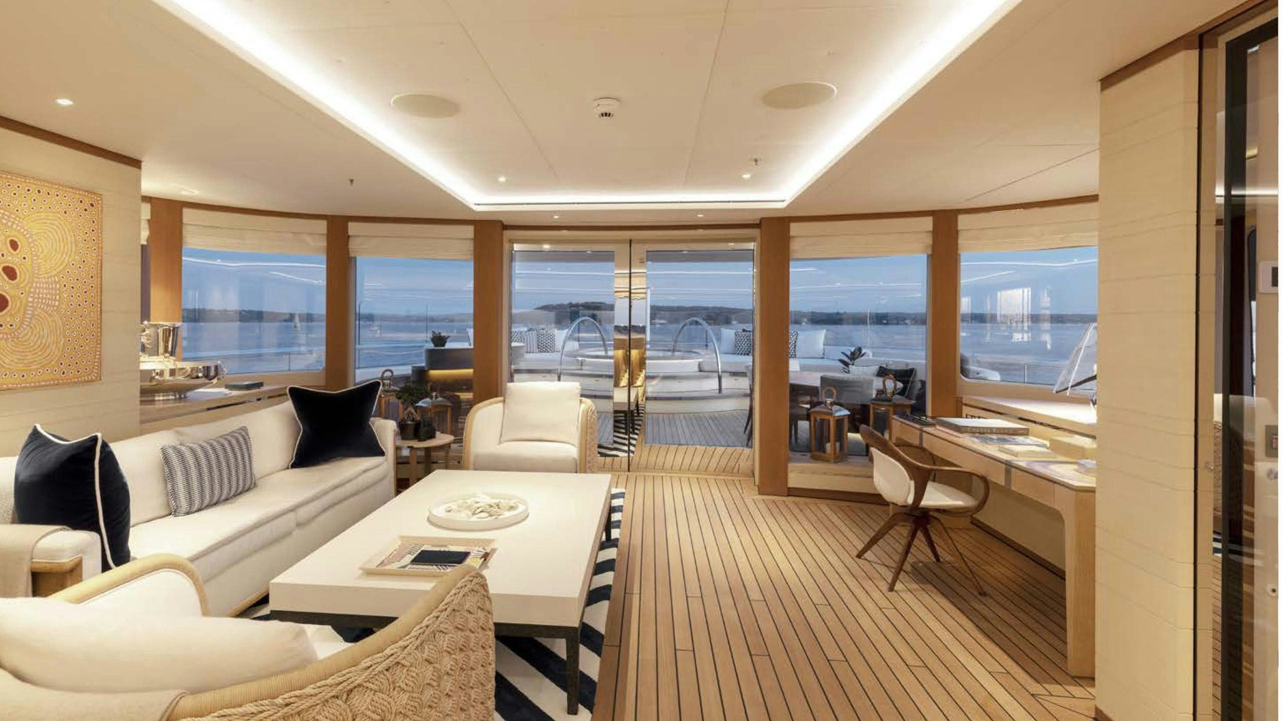a living room with a large window aboard LUNASEA Yacht for Charter