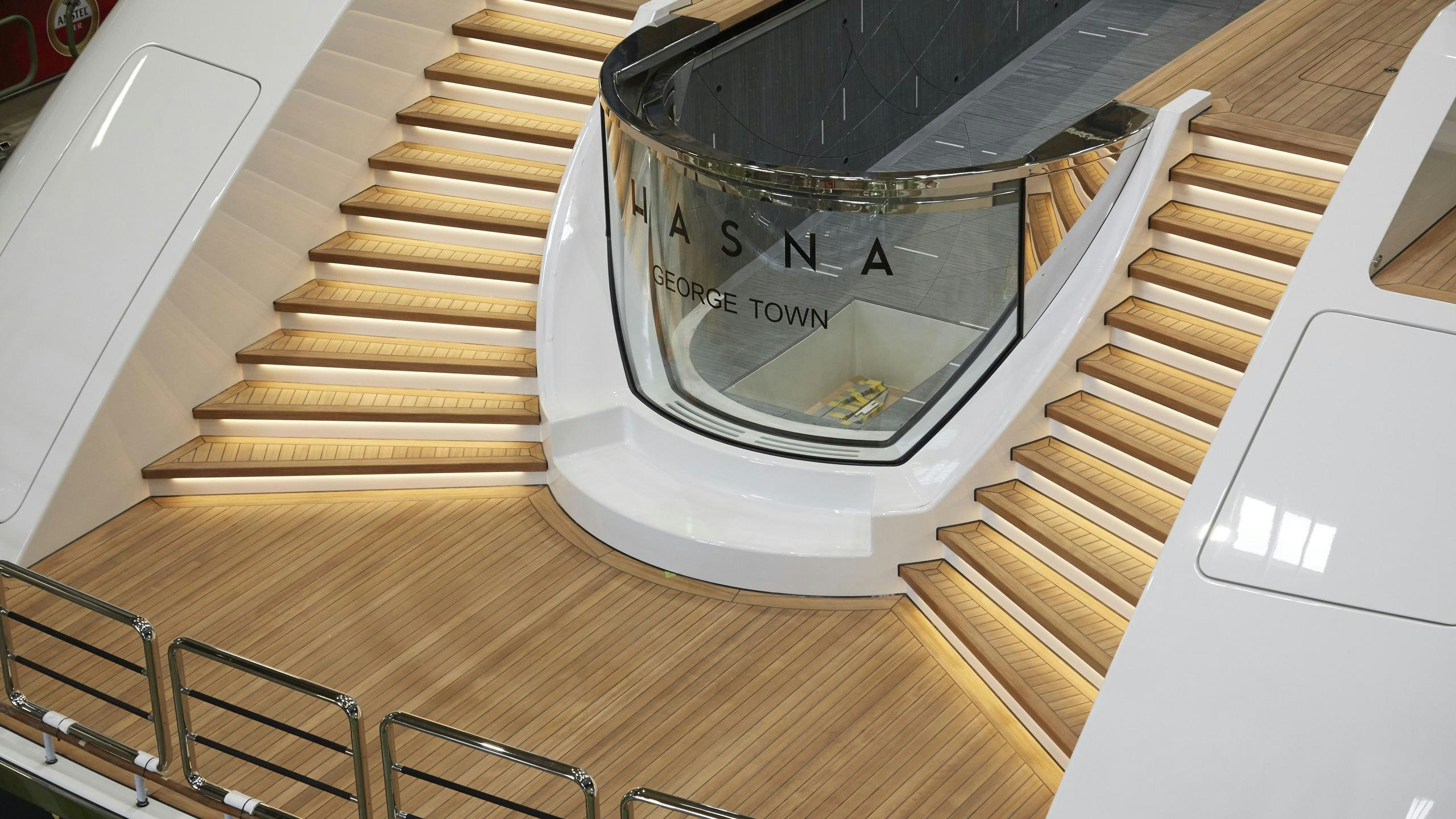 a staircase with a glass door aboard LUNASEA Yacht for Charter