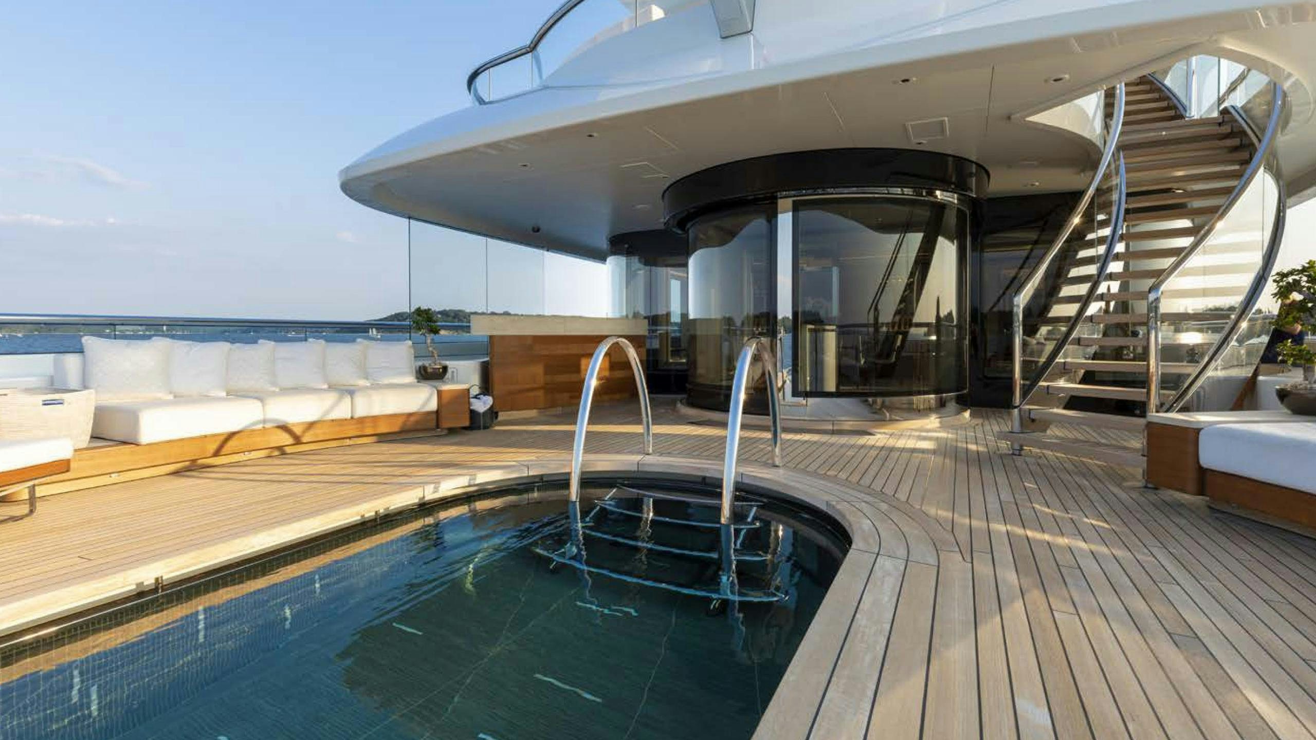 a pool on a deck aboard LUNASEA Yacht for Charter