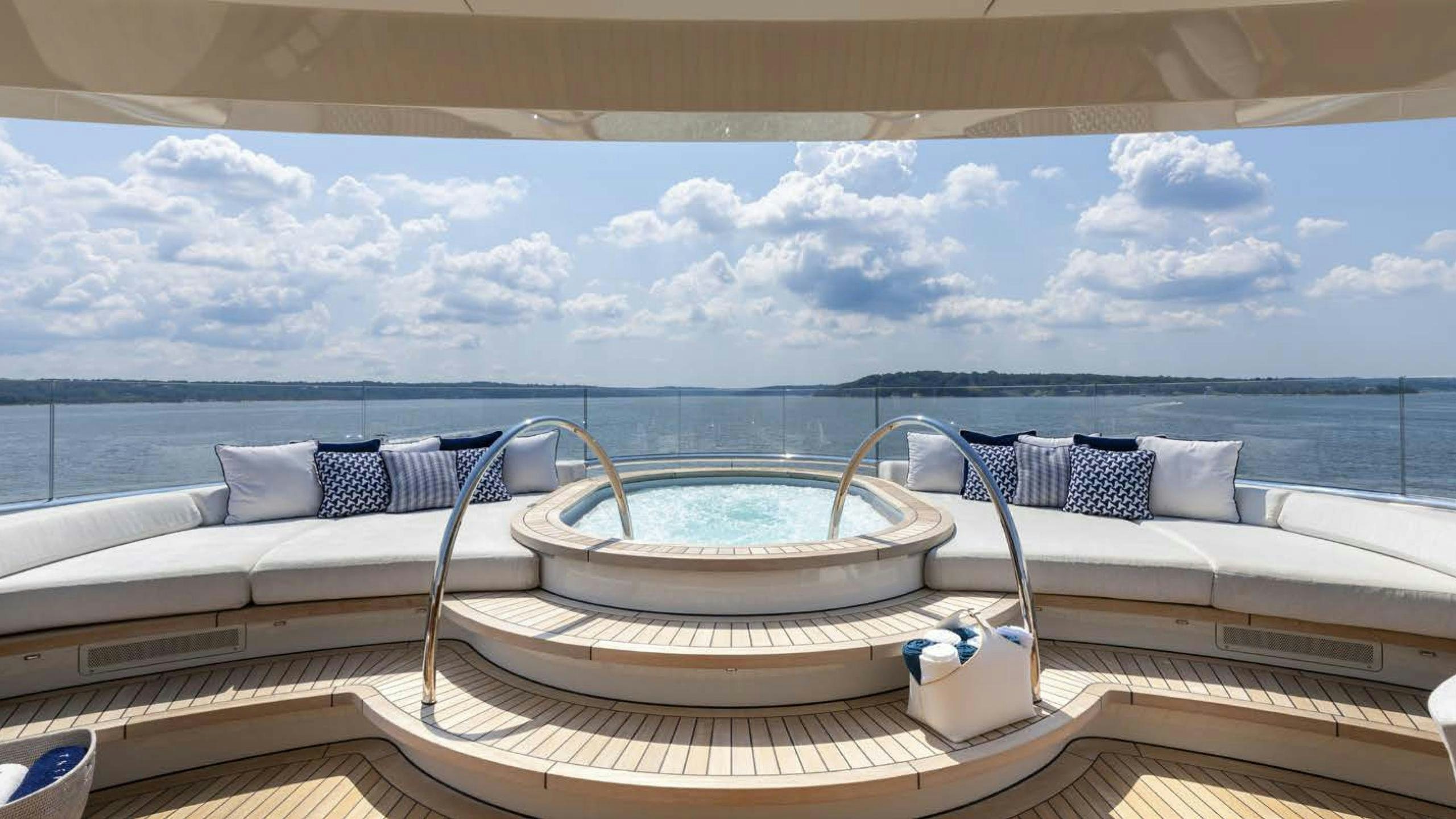 a large white pool on a deck aboard LUNASEA Yacht for Charter