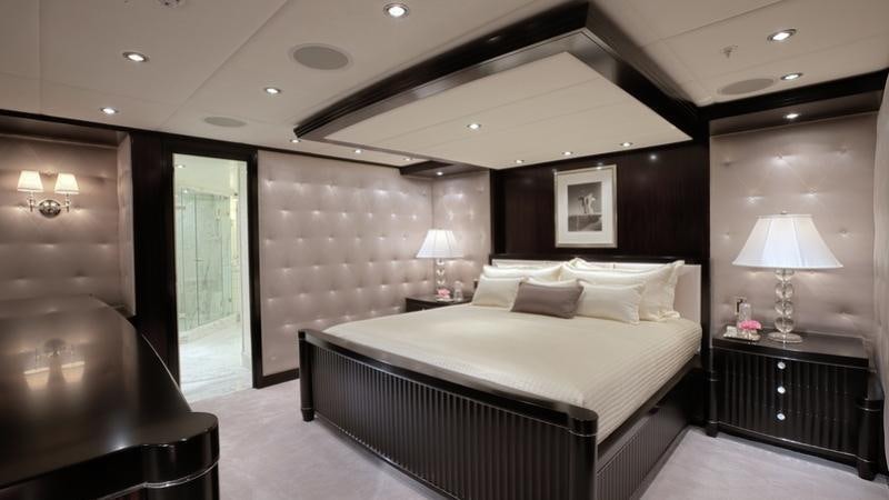 a large bedroom with a bed aboard CARPE DIEM Yacht for Charter