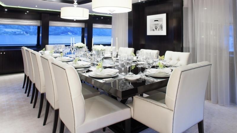 a table set for a dinner aboard CARPE DIEM Yacht for Charter