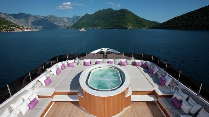 a swimming pool on a beach aboard CARPE DIEM Yacht for Charter