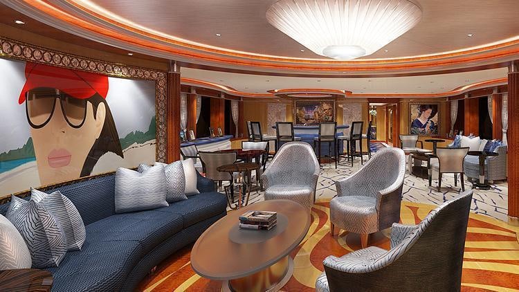 a living room with a couch and a table aboard LIBERTY Yacht for Charter
