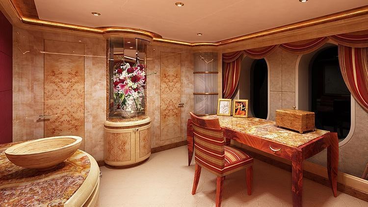 a room with a table and chairs aboard LIBERTY Yacht for Charter