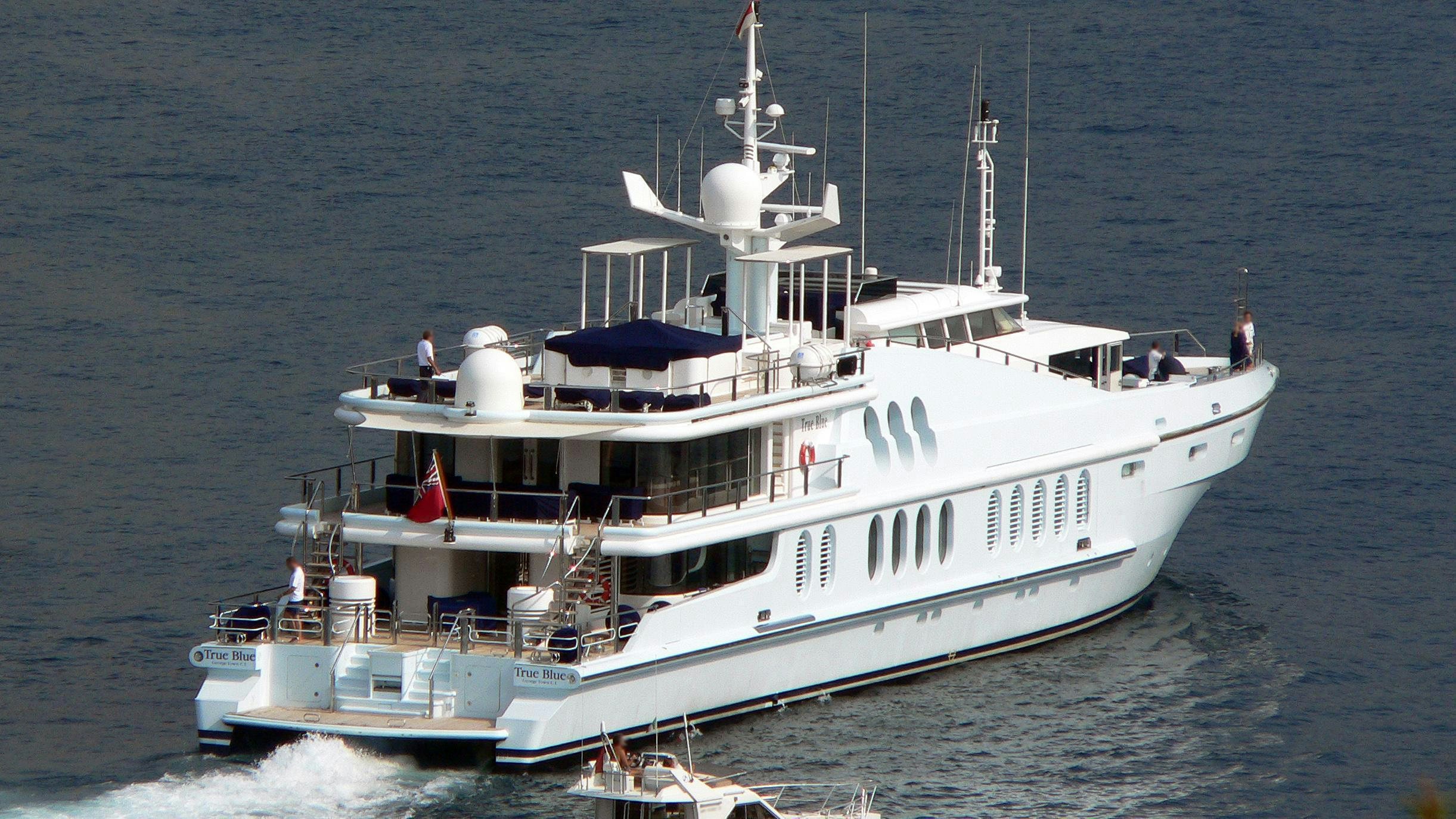 a large white ship in the water aboard OCEANA I Yacht for Charter