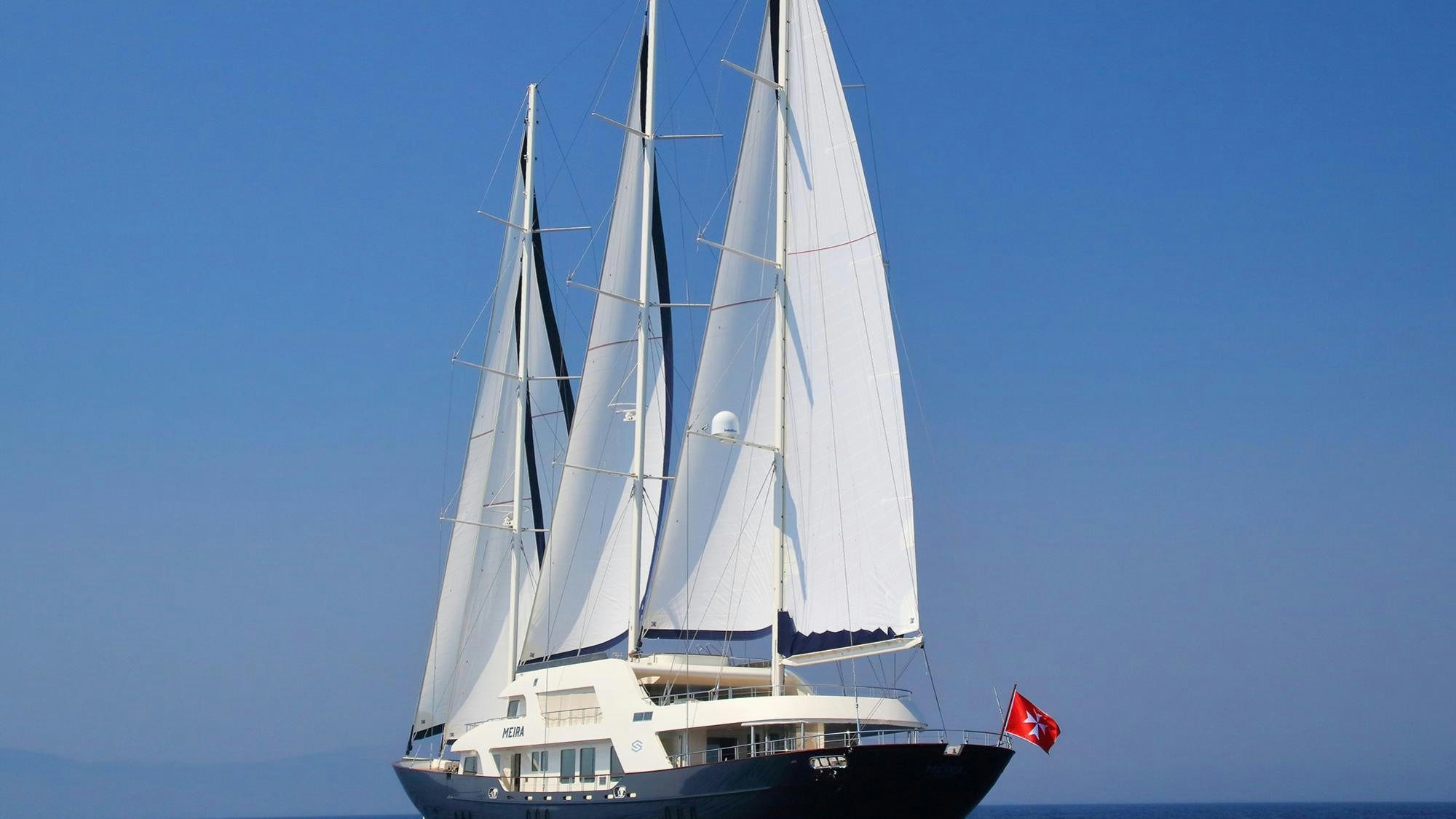 a sailboat in the water aboard MEIRA Yacht for Charter