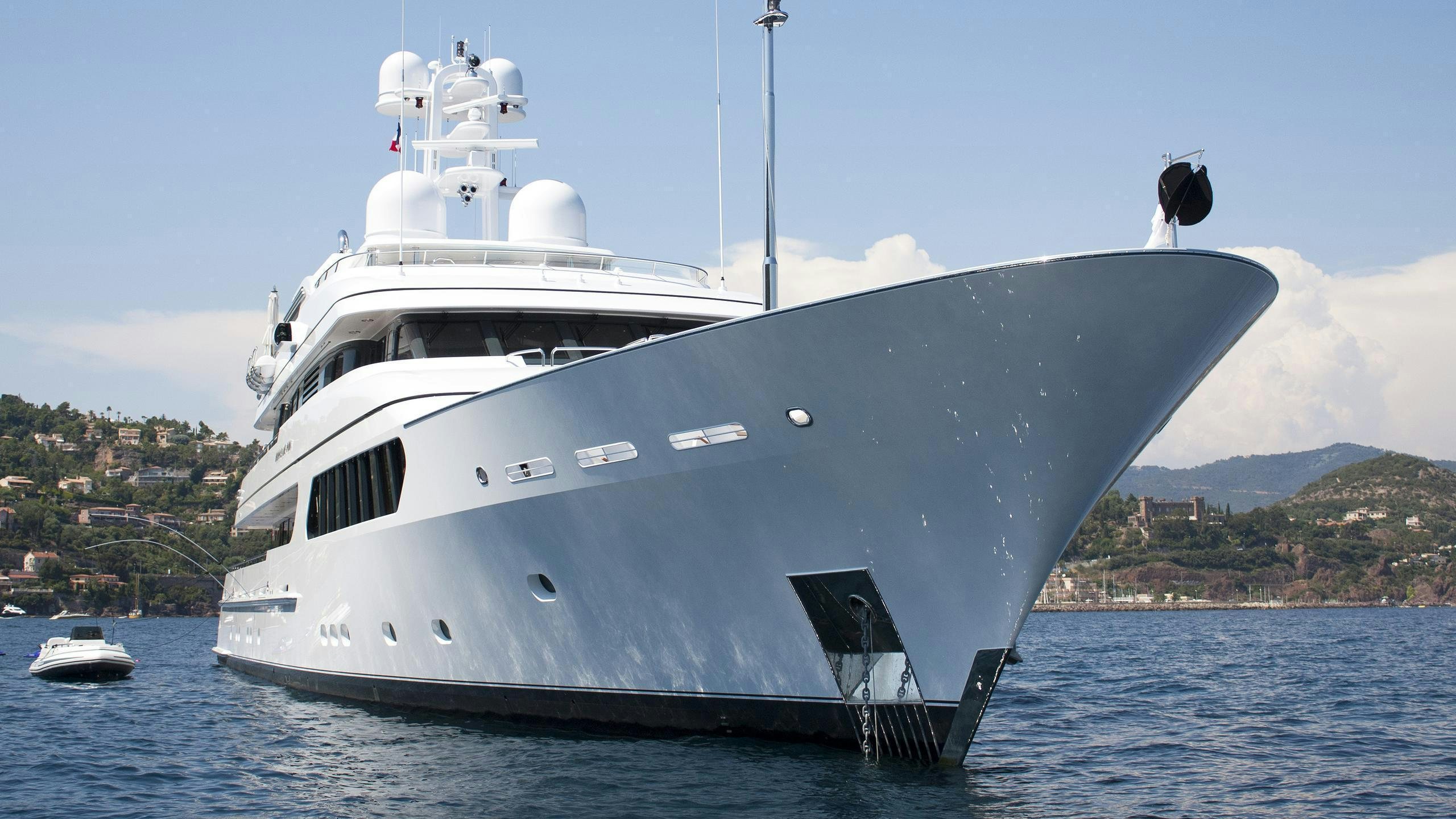 a large white ship in the water aboard HURRICANE RUN Yacht for Charter