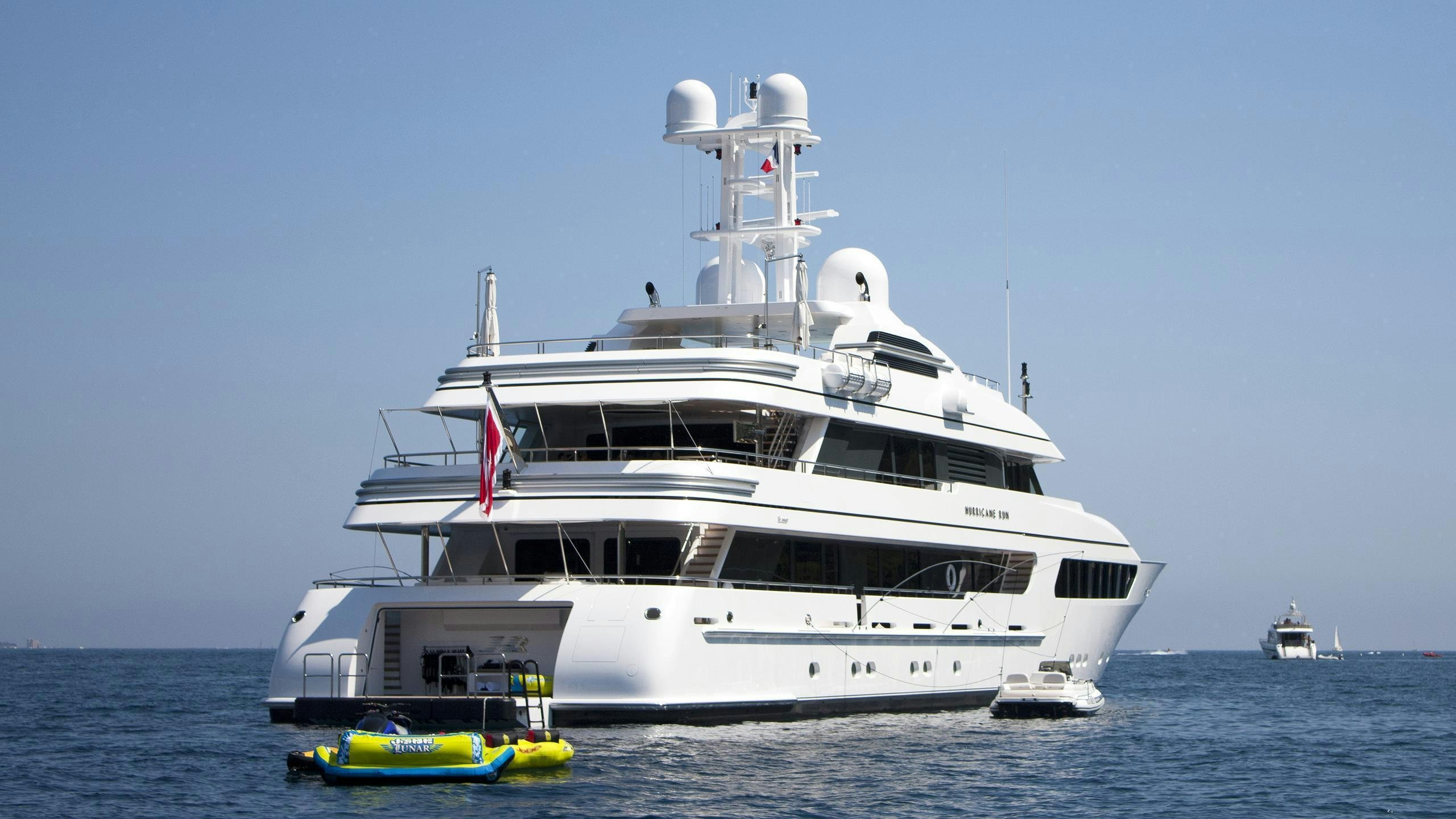 a large white ship in the water aboard HURRICANE RUN Yacht for Charter