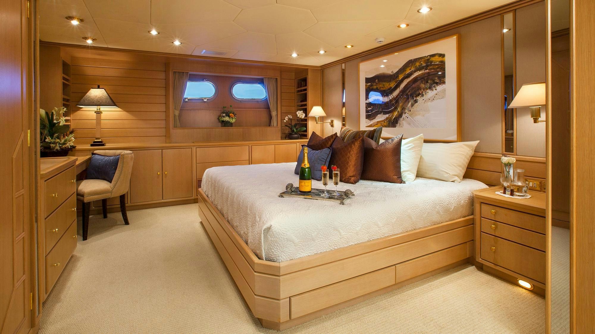 a bed in a room aboard CHANTAL MA VIE Yacht for Charter
