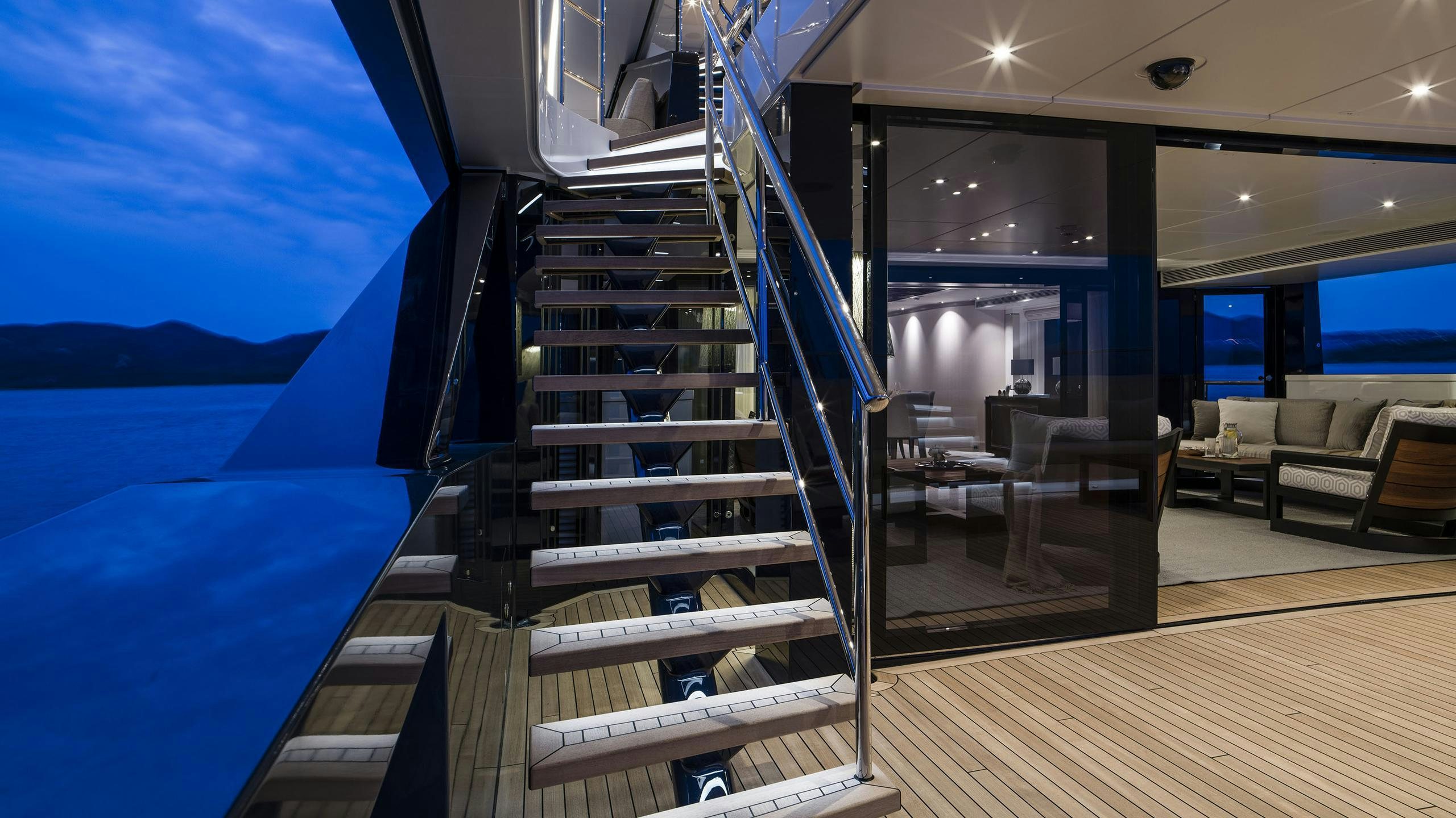 a staircase leading to a beach aboard IRISHA Yacht for Charter