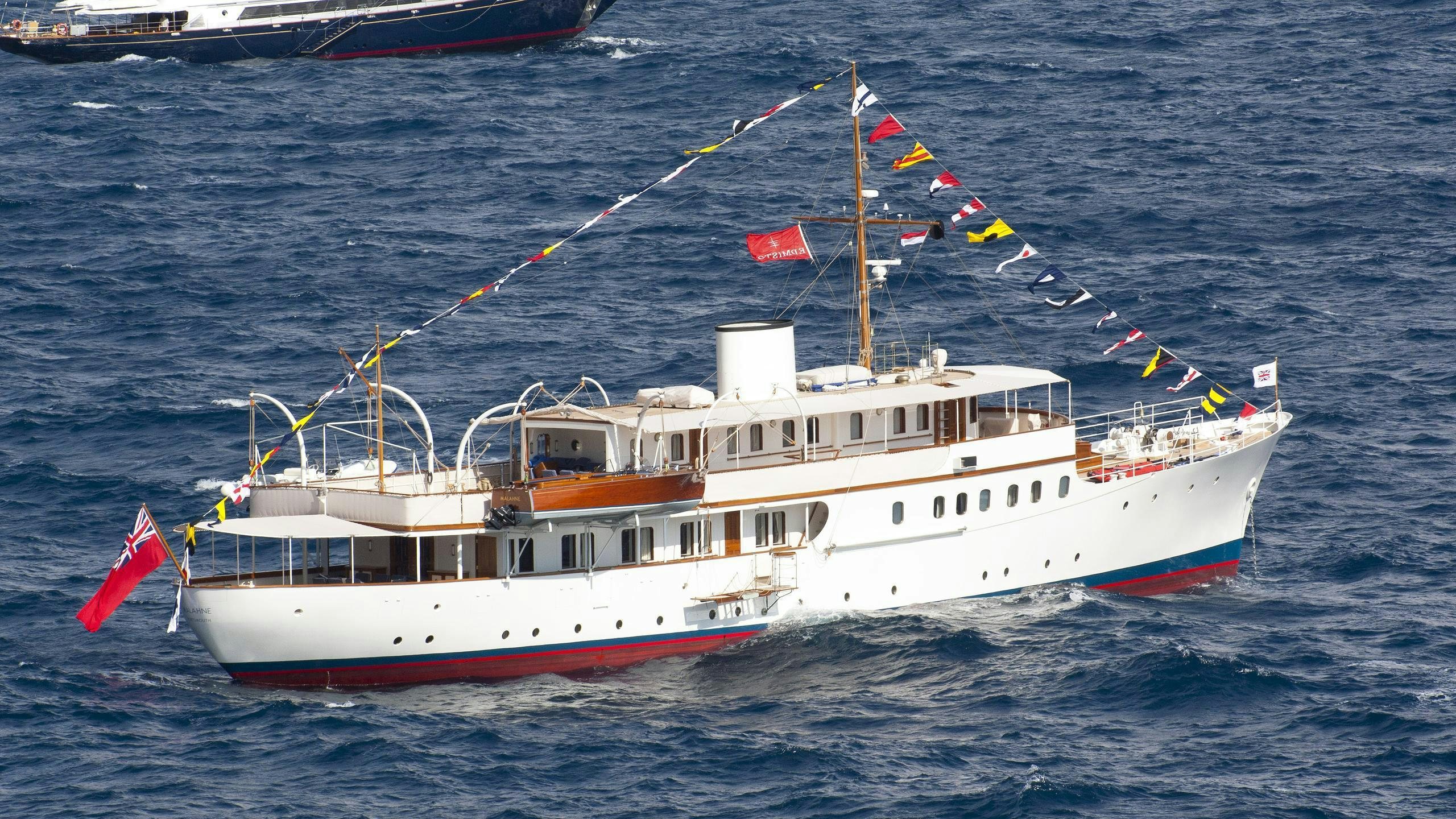 a couple of boats on the water aboard MALAHNE Yacht for Charter