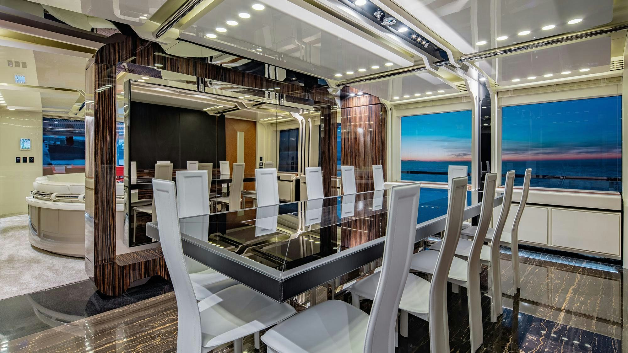 a room with chairs and tables aboard EUPHORIA II Yacht for Charter