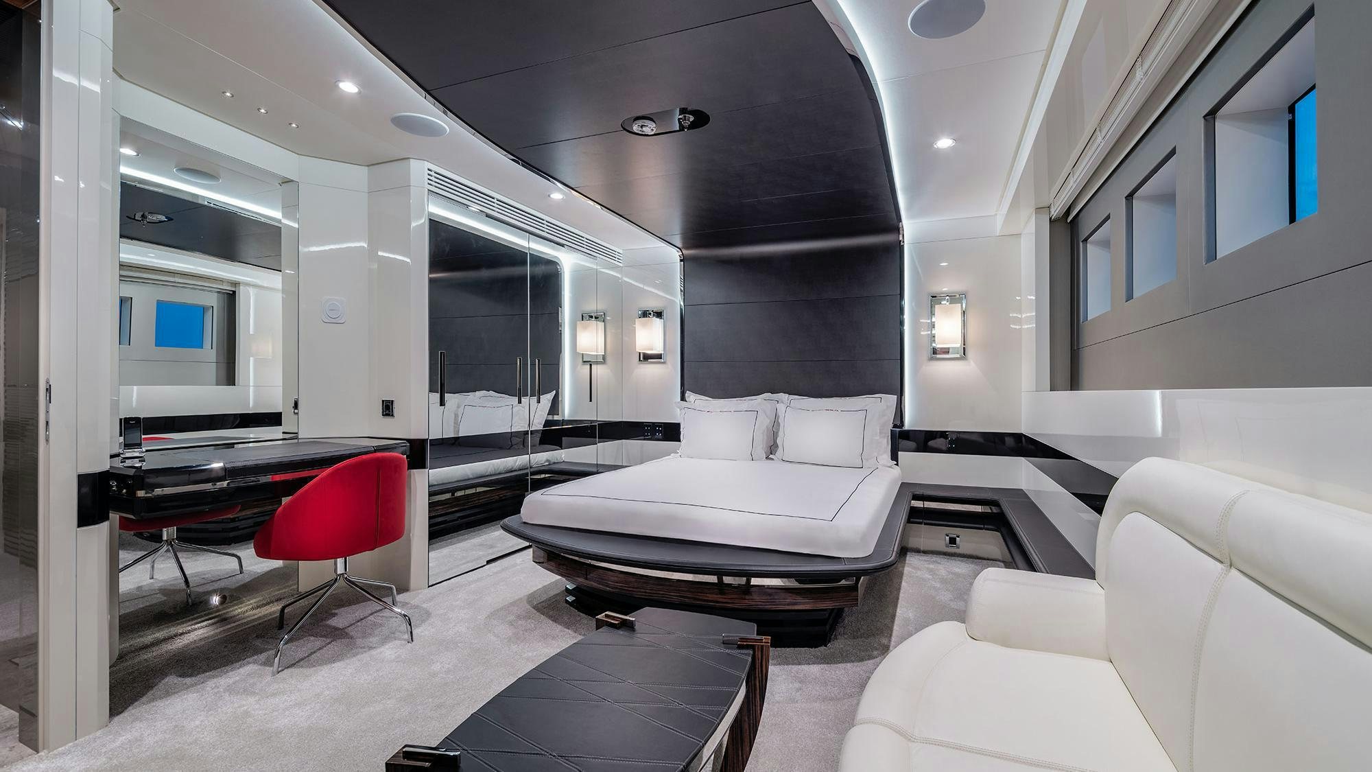 a room with a couch and a table aboard EUPHORIA II Yacht for Charter