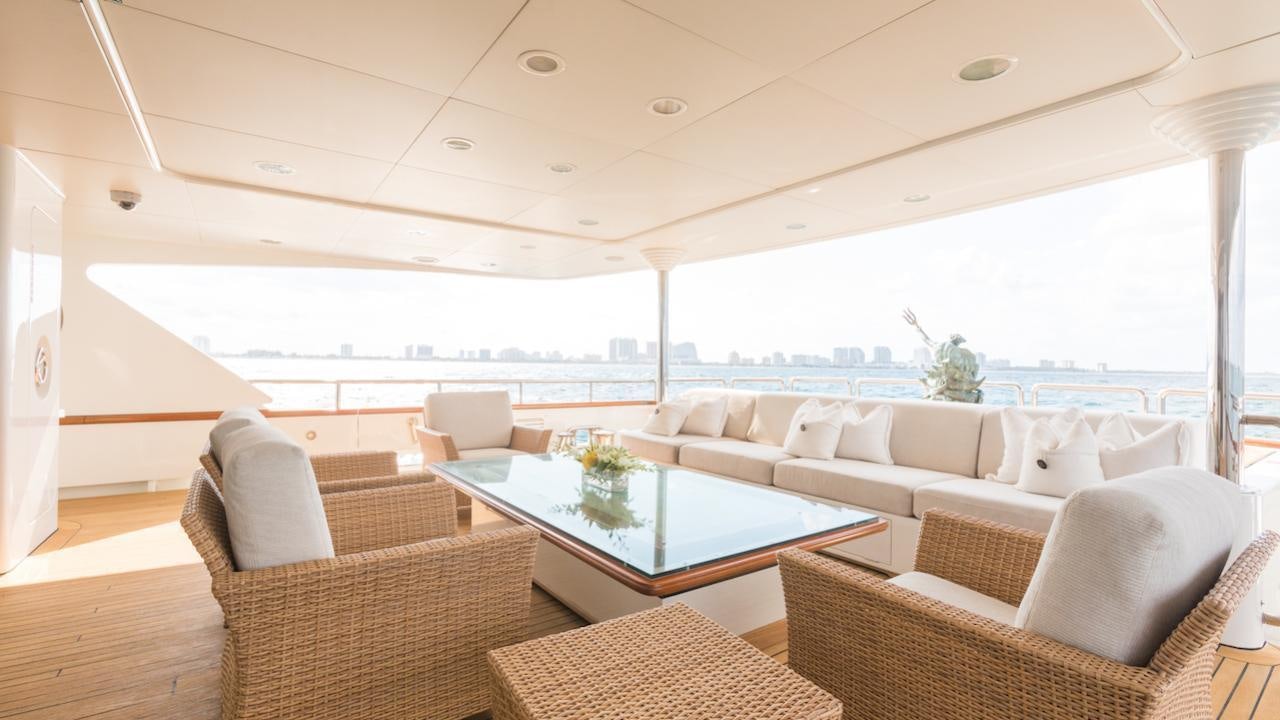 a living room with a large patio aboard BARENTS Yacht for Charter