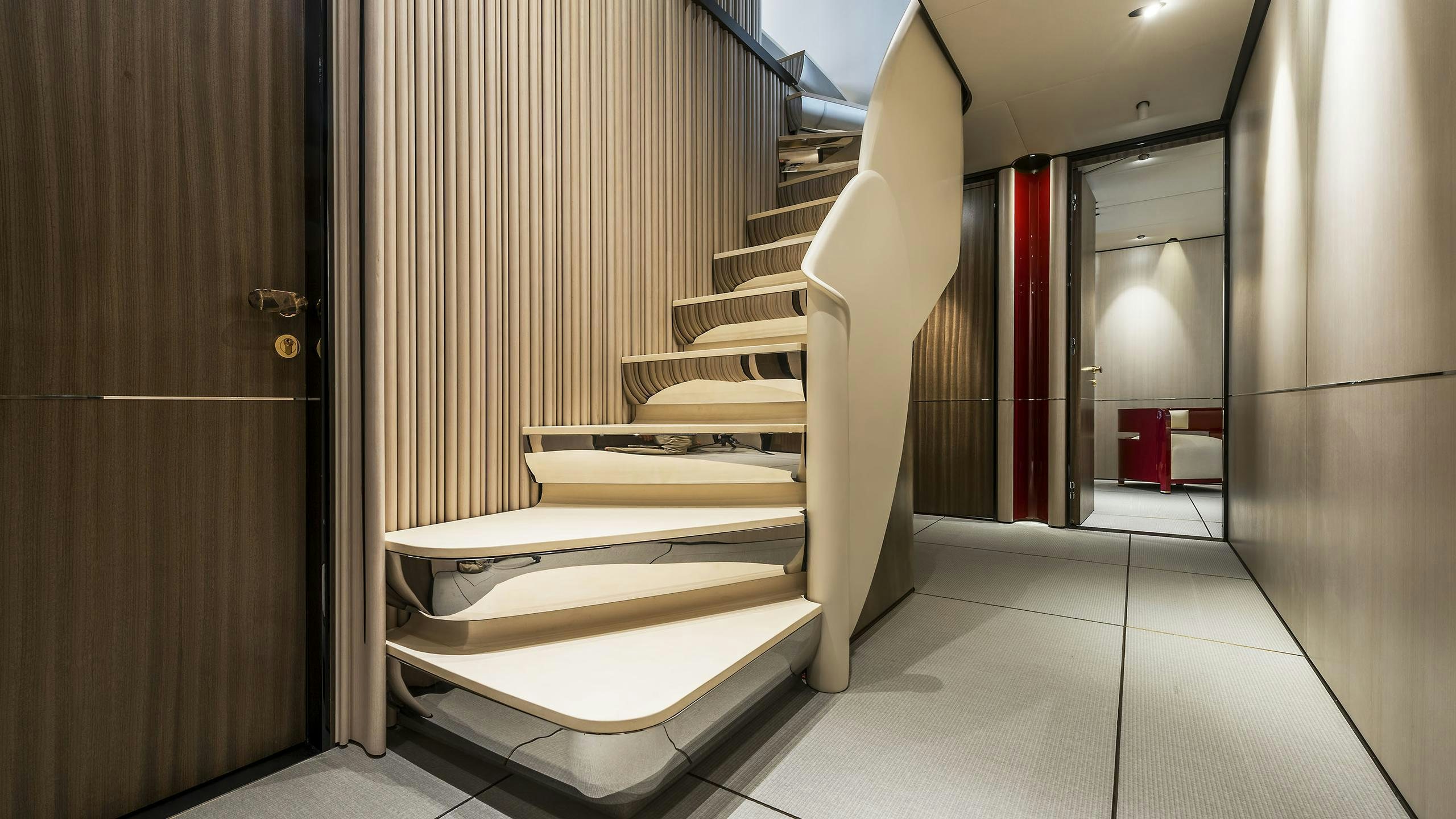 a white staircase in a building aboard ENDEAVOUR 2 Yacht for Charter