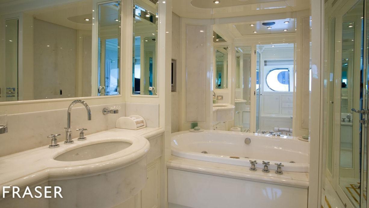 a bathroom with a large mirror aboard ELENA V Yacht for Charter