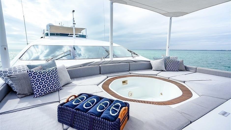 a boat on the water aboard (DELETE)INCOGNITO Yacht for Charter