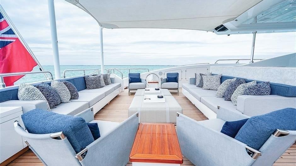 a large living room with a large open window aboard (DELETE)INCOGNITO Yacht for Charter