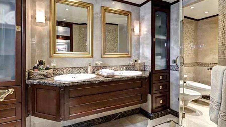 a bathroom with a large mirror aboard AZTECA Yacht for Charter
