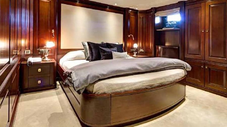 a bed in a room aboard AZTECA Yacht for Charter