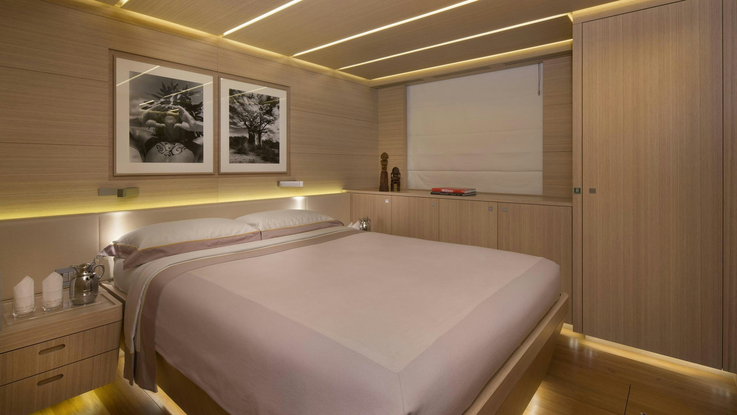 a room with two beds aboard OHANA Yacht for Charter