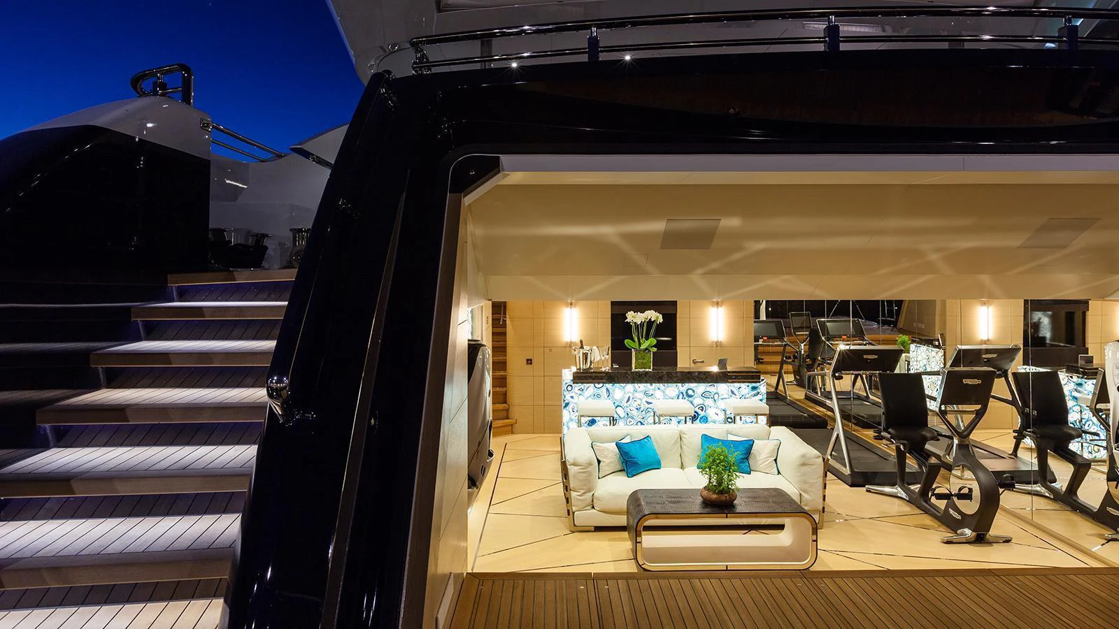 a living room with a couch and a table aboard LADY LI Yacht for Charter